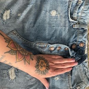 Mini denim skirt is new without tags but never worn. Lot sale of free people.